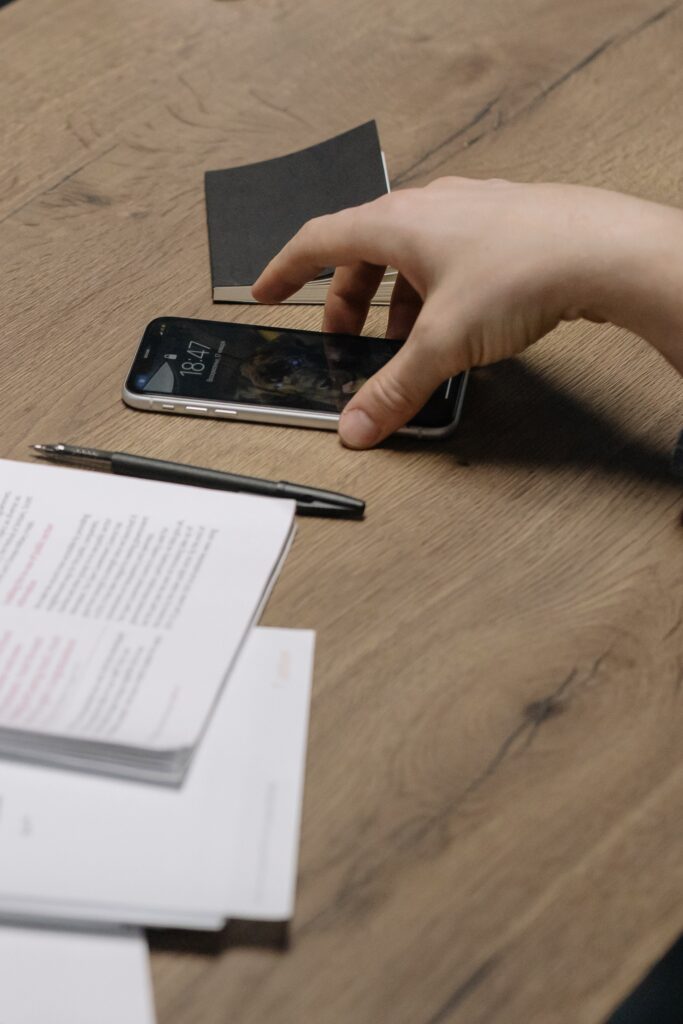 books-on-table-with-pen